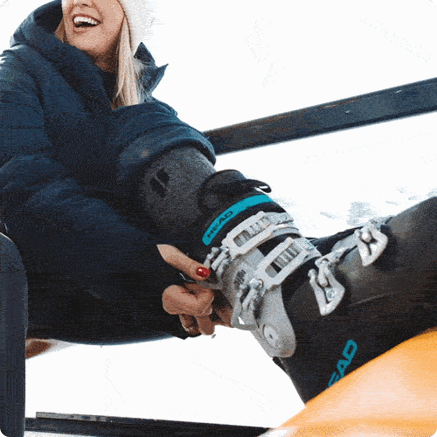 Girl wearing Ski/Snow Socks on the slopes lift.