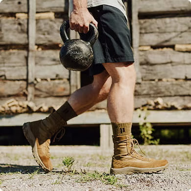Tactical Socks being worn in boots while outside carrying Kettleball.