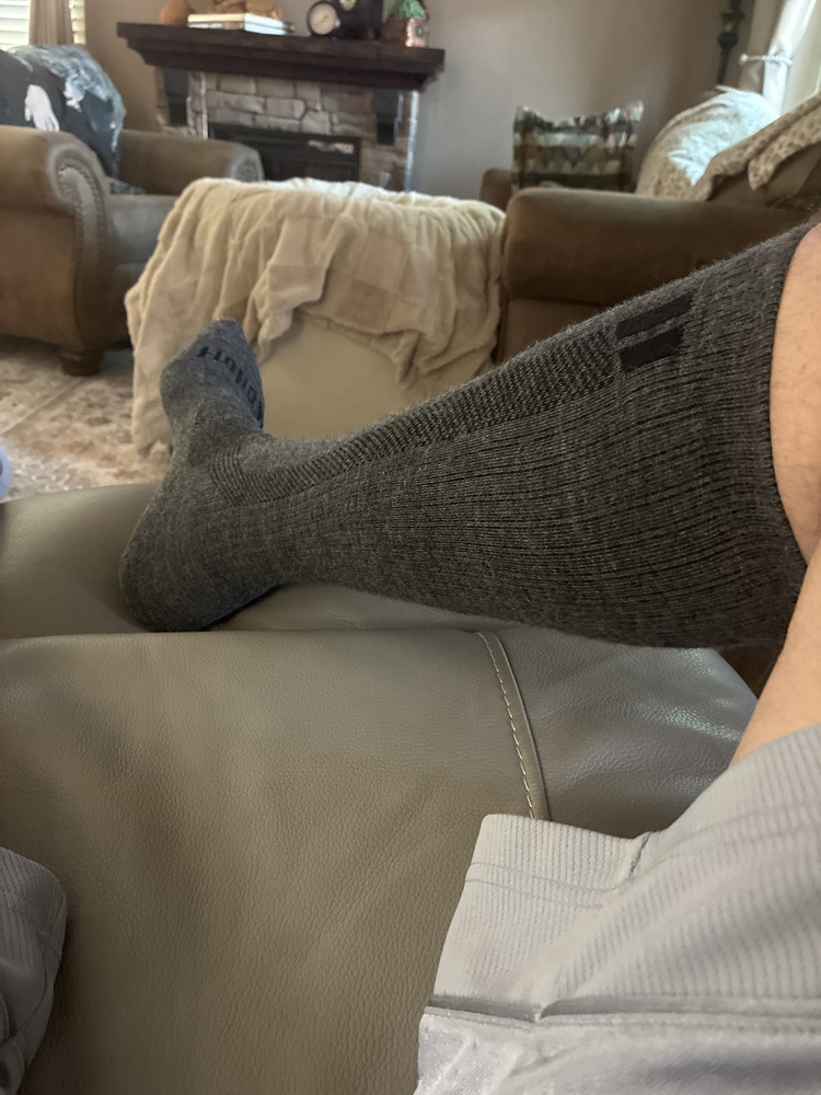 Hollow compression socks worn by a customer
