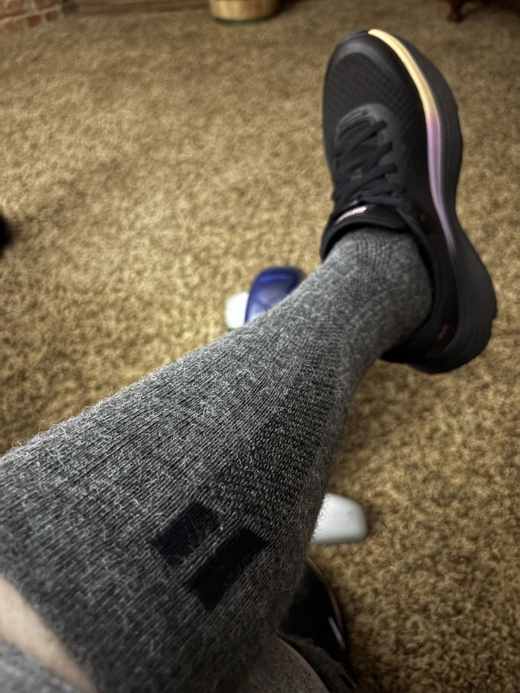 Hollow compression socks worn by a customer